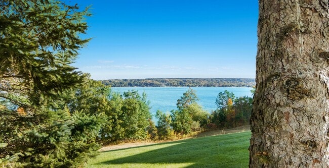 Building Photo - Lakefront End-Unit Condo with Crystal Lake...