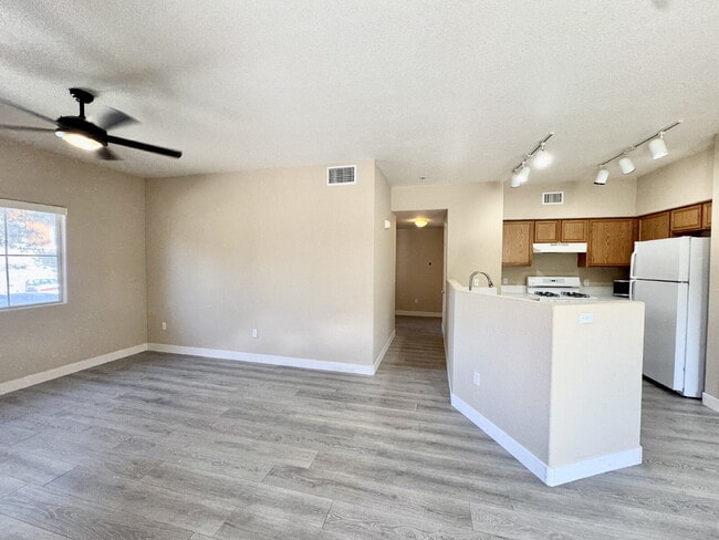 Building Photo - DOWNSTAIRS CONDO | GATED COMMUNITY | CENTENNIAL HILLS | UPDATED 3 BEDROOM