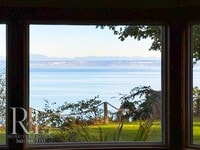 Building Photo - Waterfront Rustic Retreat with Vaulted Ceilings, Picture Windows & Lofted Nook