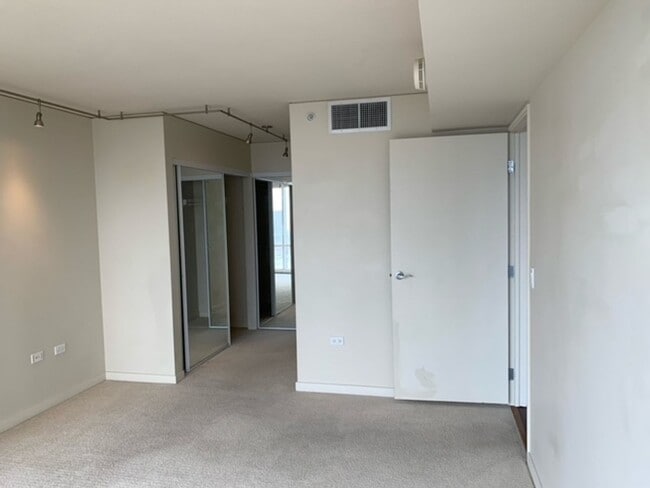 Building Photo - Moana Pacific - 2 bedroom plus den, 2 bath Condo with 2 parking - avail now!
