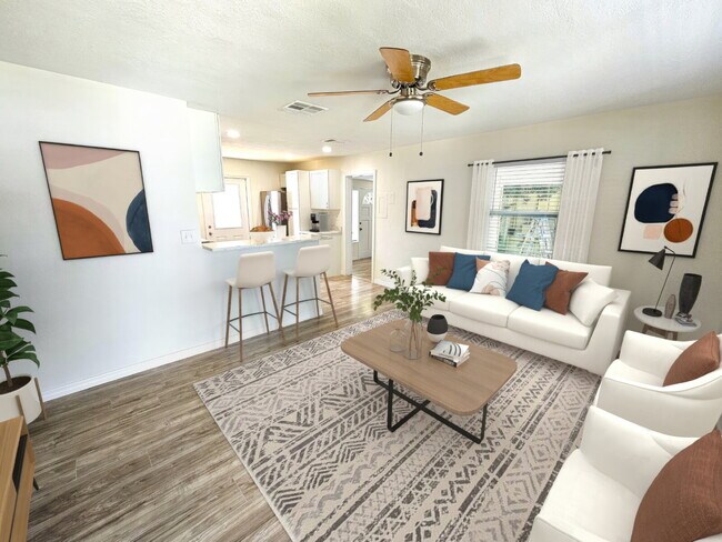 Building Photo - fully renovated 2-bedroom, 1-bathroom home with bonus guest room or office and oversized fenced yard