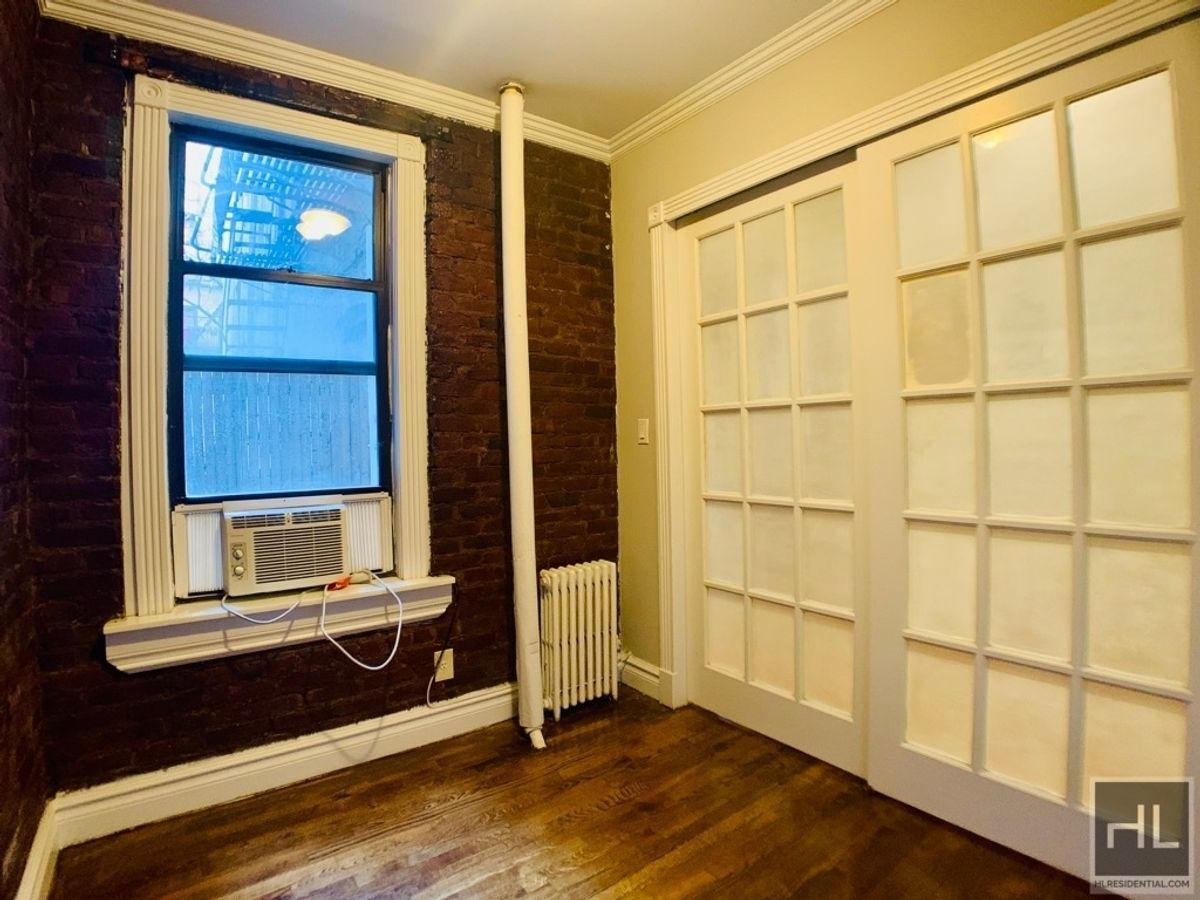 Building Photo - Renovated East Village 2-Bedroom with Sunl...