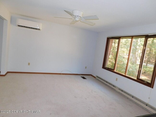 Building Photo - 3-bedroom, 2-bath home featuring an open f...