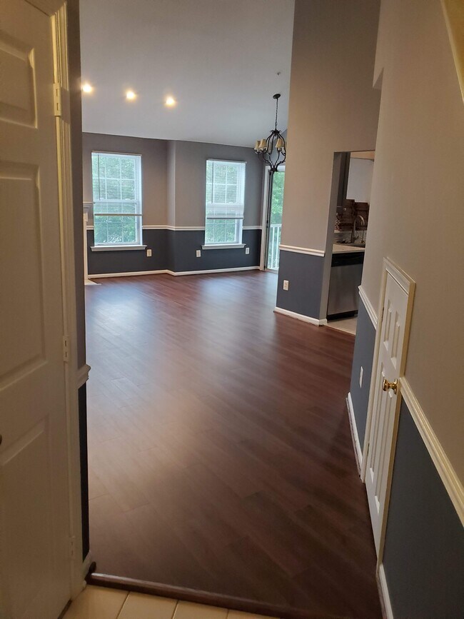 Living/dining room with new flooring - 5921 Founders Crossing Ct