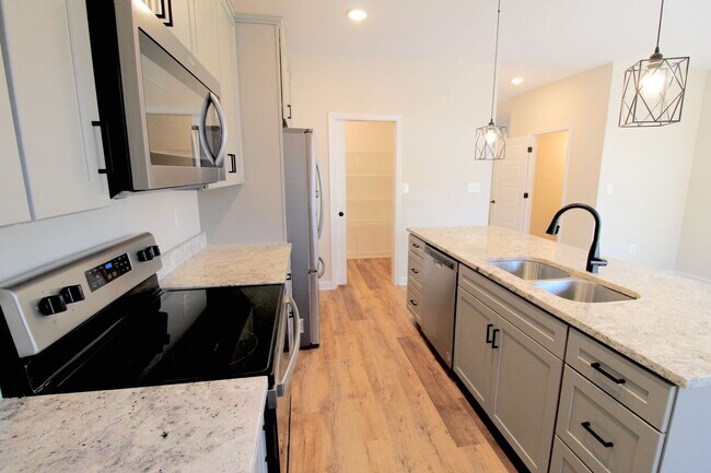 Building Photo - Spacious 4 Bedroom, 3.5 Bath Townhome with...