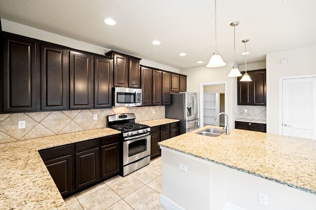 Building Photo - A Home That Adapts to You – Luxury, Flexibility & Entertainment Await!