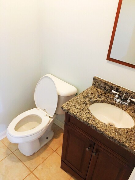 A downstairs half bathroom off of the laundry room - 190 Hutchinson St NE