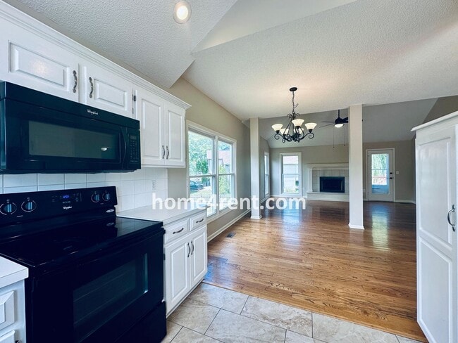 Building Photo - Brand New Paint, Wood Floors, Walkout Fini...