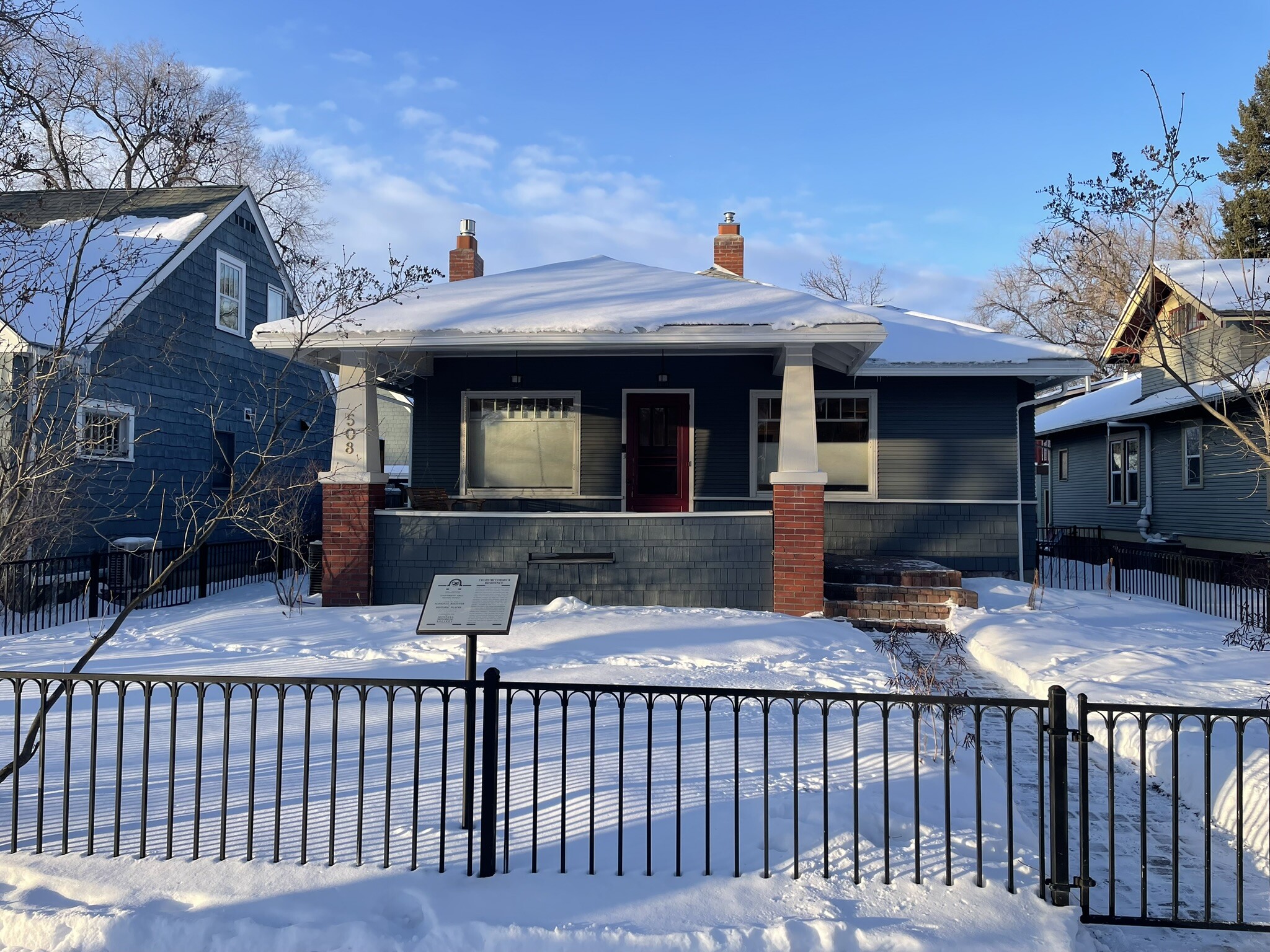 front of home (winter) note fence is lower than in backyard - 508 Daly Ave