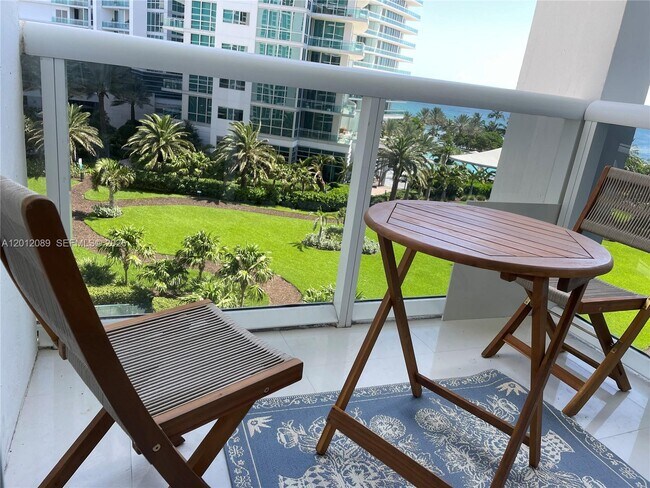 Building Photo - 10275 Collins Ave