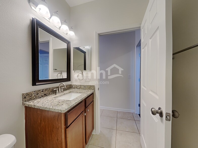 Building Photo - 9672 Woodstone Mill