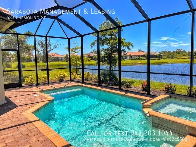 Building Photo - 2 Bed 2 Bath with Den Lake View Pool Home ...