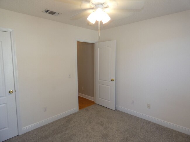 Building Photo - Charming 4-Bedroom Home With Sunroom