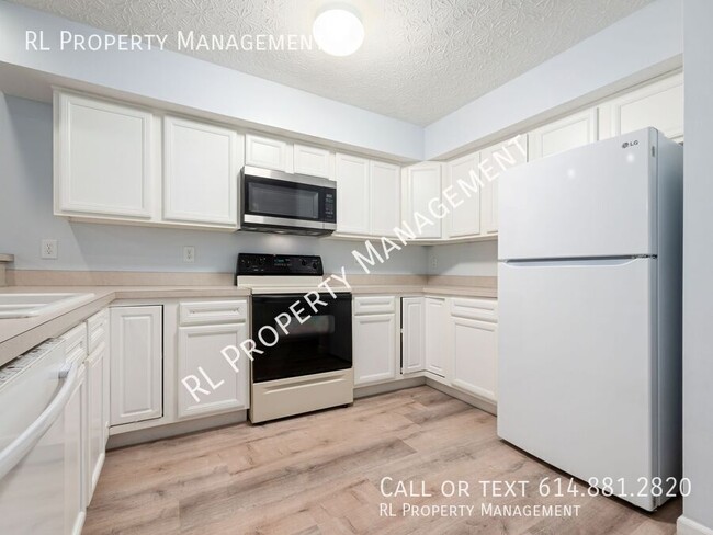 Building Photo - Nice 2 Bedroom/1.5 Bathroom Condo