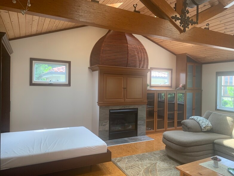 Your Fireplace and. aCornr of the most comfortable bed - 14715 Greenleaf St