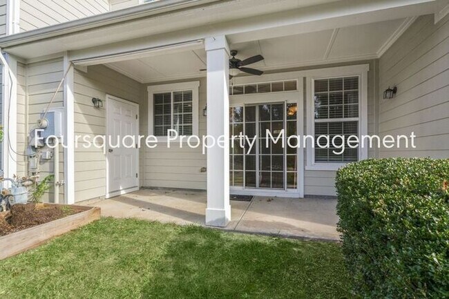 Building Photo - Charming Townhome with Open Layout, Back Patio & One-Car Garage – Near RTP, RDU & Everyday Conven...