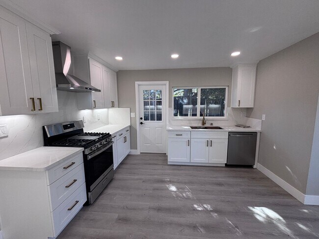 Building Photo - EVERGREEN- Newly Remodeled 3BR/2 BA Home with Spacious Backyard