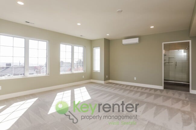 Building Photo - Spacious Living with Balconies, Deck, and Private Yard