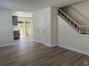 Building Photo - For Rent: 2BD/1.5BA Two-Story Condo – Bull...