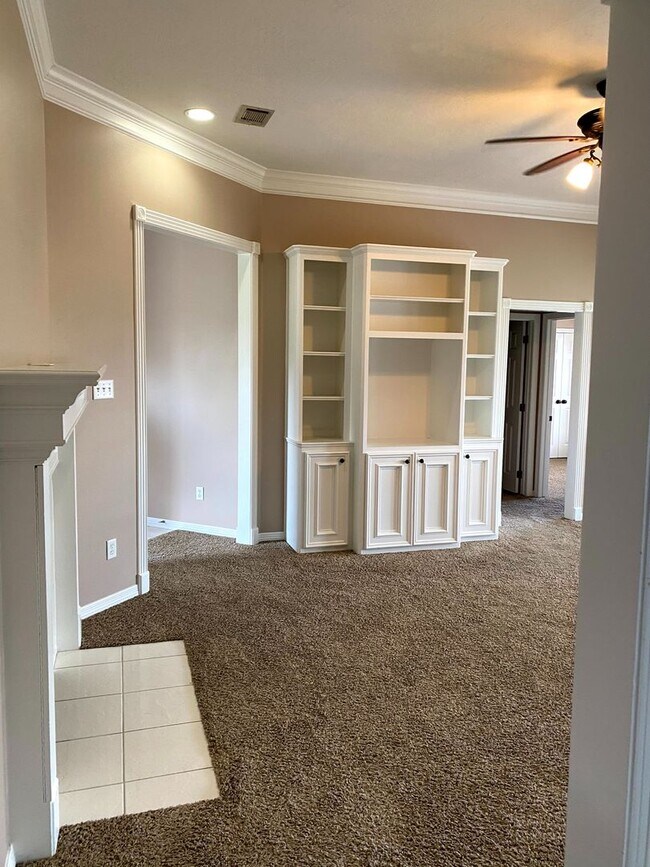 Building Photo - FABULOUS THREE BEDROOM HOME WITH LARGE DECK, FIREPLACE AND FLEX ROOM