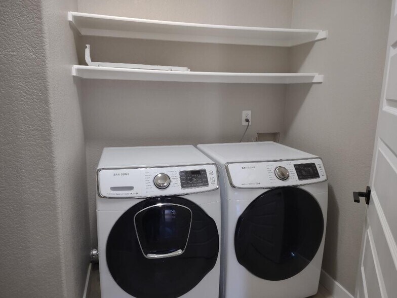 laundry room - 8318 S Independence Cir
