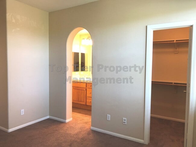 Building Photo - **Gated 3 bed, 3 bath Townhome with 2-Car ...