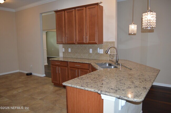 Building Photo - 4559 Plantation Oaks Blvd