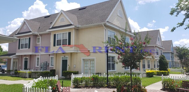 Building Photo - 4 BR / 3 FULL BATH (INCLUDES 2 MASTERS) 2 STORY (NEAR DISNEY!) GATED COMMUNITY WITH COMMUNITY POO...