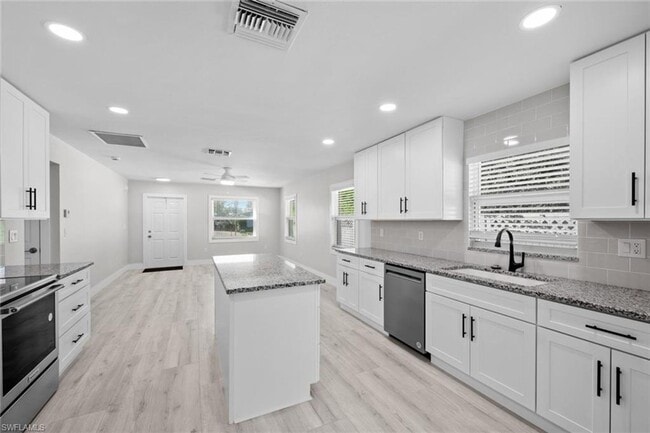 Building Photo - ANNUAL RENTAL - 2 BED / 2 BATH ATTACHED GA...