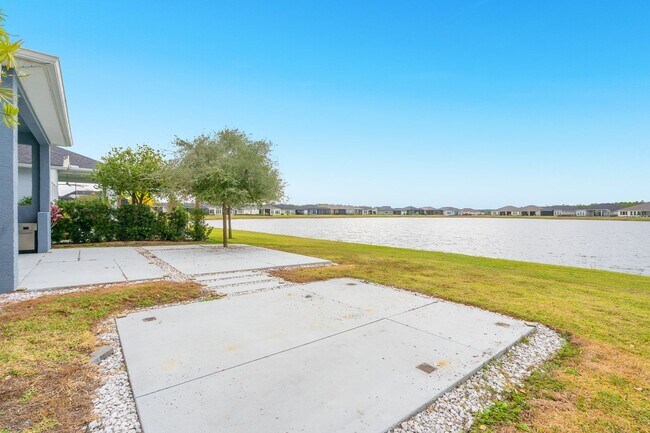 Building Photo - Luxurious Solar Powered 4 Bedroom, 3 Bath Waterfront Home with office & Upgrades Galore!