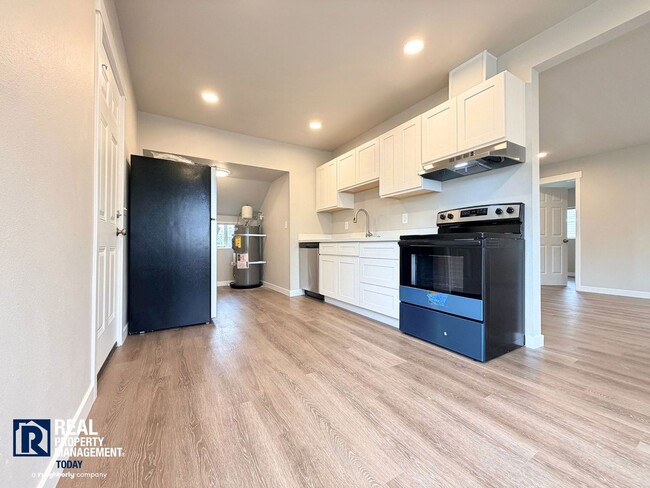 Building Photo - MOVE-IN SPECIAL! Completely Renovated 2 Bedroom Home Near PLU | New Kitchen & Stainless Appliances