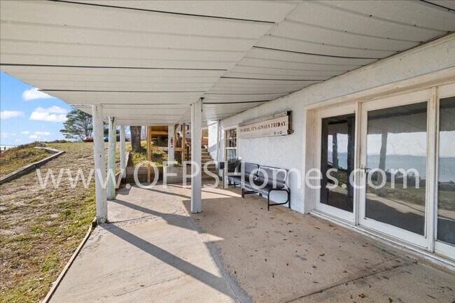 Building Photo - Stunning 4-Bedroom, 3-Bath Waterfront Home in Choctaw Beach – 140ft of Bayfront Bliss!