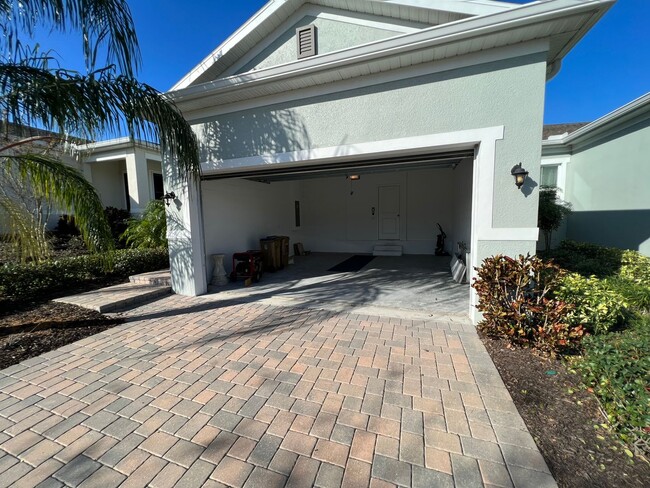 Building Photo - 55+ community in Four Seasons of Orlando 2 bedroom, 2 bathroom, with a 2 stall attached garage on...