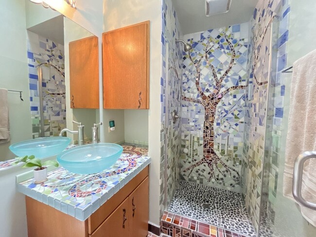 Building Photo - One-of-a-Kind Custom Home with Wall of Windows, Stone Fireplaces, Expansive Entertainment Space &...