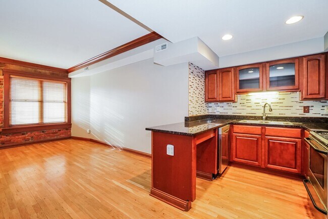 Building Photo - Charming 1-Bedroom Apartment with Exposed Brick, Hardwood Floors & Updated Kitchen
