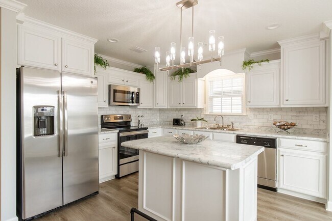 Building Photo - Beautiful 3-Bedroom Home with Modern Finishes and Outdoor Living in Nelson Hill NEAR the pond