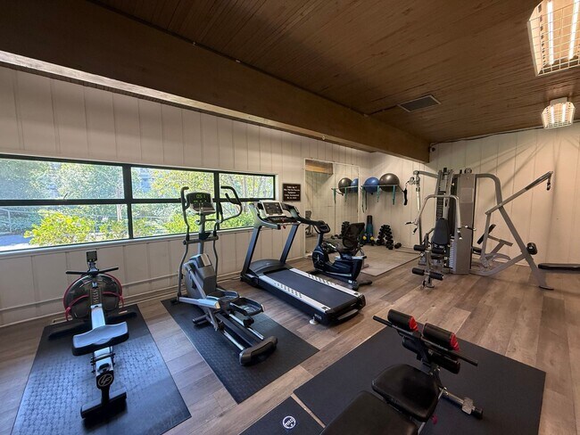 Building Photo - STUNNING THREE BEDROOM PLUS OFFICE MARINER GREEN CONDO WITH GREAT OUTDOOR SPACE