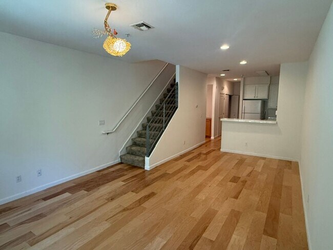 Building Photo - Large 3-Bedroom, 3.5 Bathroom Townhome in Metro Walk Village Neighborhood