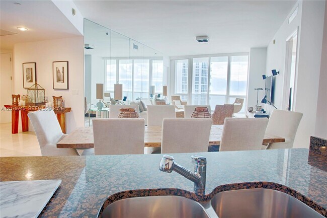 Building Photo - 15811 Collins Ave