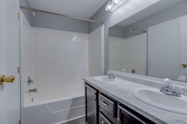 Building Photo - For Rent: Four-Bedroom, Two-Bathroom Available NOW