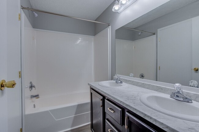 Building Photo - For Rent: Four-Bedroom, Two-Bathroom Singl...