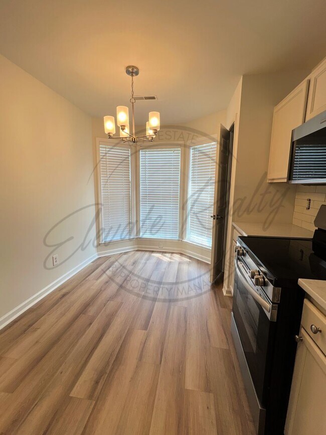 Building Photo - SPECIAL: FIRST MONTHS RENT FREE! Two Bedro...