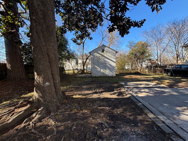 Building Photo - Beautifully renovated four bedroom, three ...