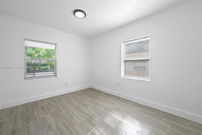 Building Photo - 9312 NW 3rd Ave
