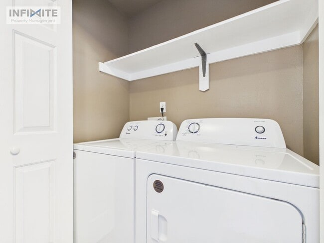 Building Photo - 2 Bedroom | 2 Bathroom Condo Single-Level Lower-Level Living