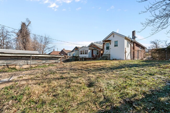 Building Photo - 5451 Genevieve Ave