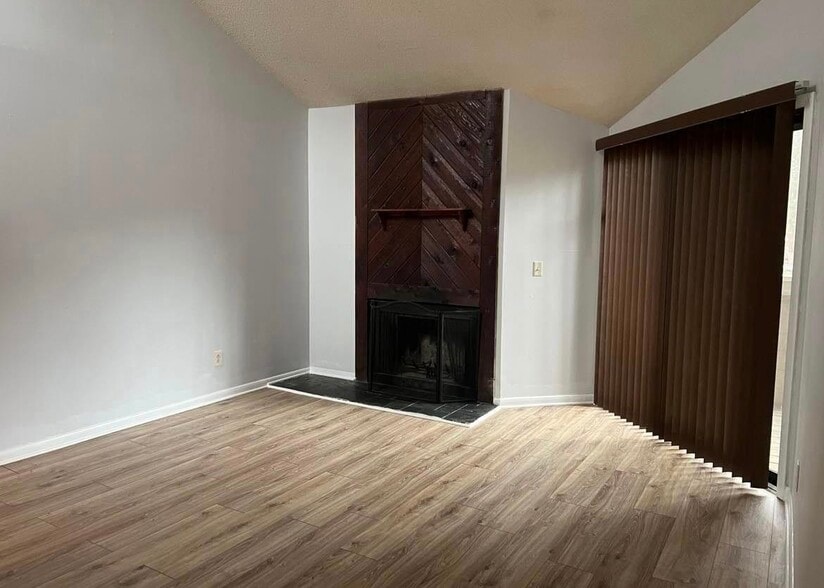 Living Room (with fireplace) - 4517 Sharon Chase Dr