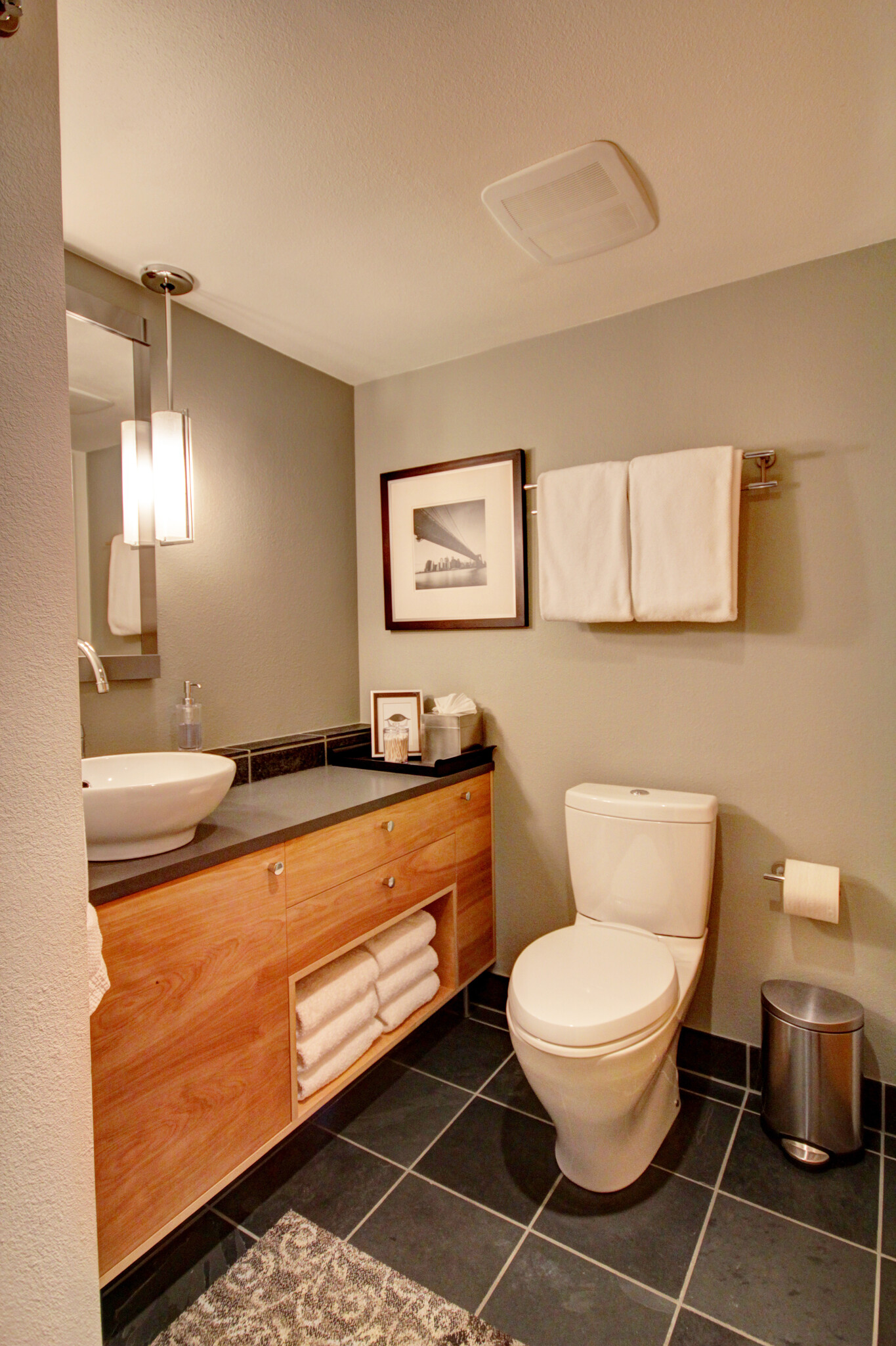Guest/Powder Room has custom wood vanity with Silestone top, and Toto toilet - 535 Summit Ave E