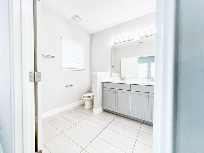 Building Photo - Lake Nona Move-In Special! Save $100/Month | 4 Bed, 3.5 Bath Laureate Park Townhome