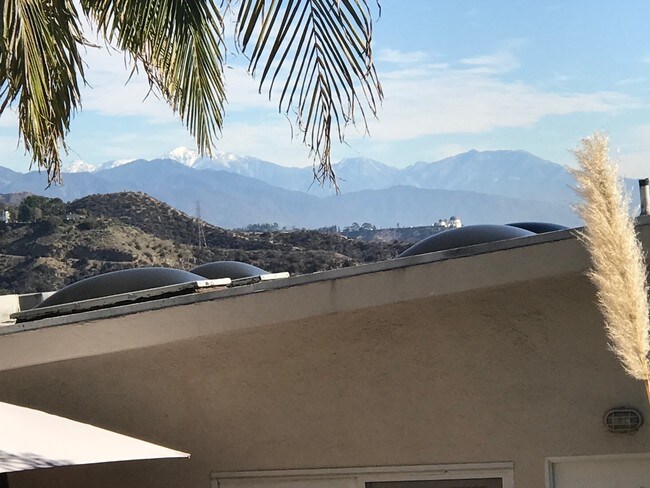 Snow capped mount & Griffith Park Observatory - 8567 Walnut Dr